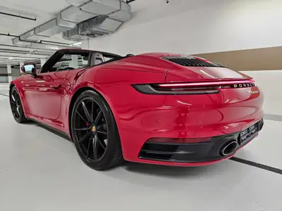 Porsche 911 Carrera S Cabriolet PDK — Roadster emblématique, 450 ch et toit électrique — side view