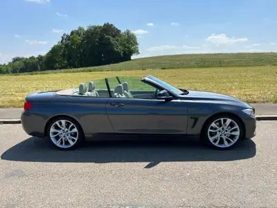 BMW 435i Cabriolet Steptronic — Roadster sportif sans toit, 306 ch à faible kilométrage — côté