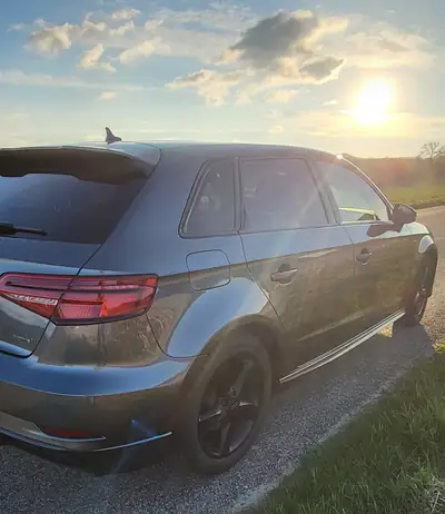 Audi A3 Sportback 40 TFSI Sport quattro — Berline sportive 5 portes, traction intégrale, 140 000 km — rear view