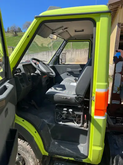 IVECO Turbo Daily 40.10 — Benne basculante robuste, bras multilift intégré — arrière