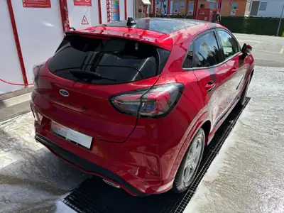 Ford Puma 1.0 MHEV ST-Line X — SUV compact hybride, 9400 km seulement — fianco