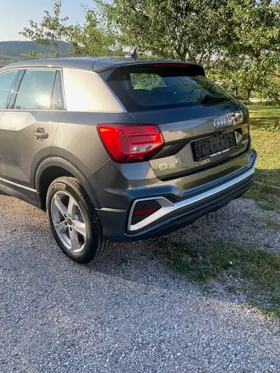 Audi Q2 40 TFSI quattro S-tronic — SUV premium 2024, seulement 1000 km — side view