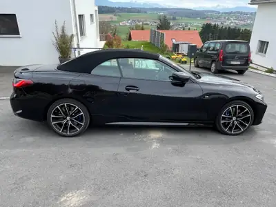 BMW M440i xDrive Cabriolet — Roadster sportif hybride 374 ch, 11'000 km — Heckansicht
