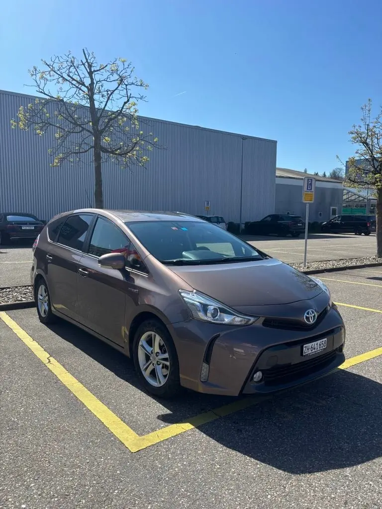 Toyota Prius+ 1.8 VVT-i HSD Sol Premium — 7 places, hybride économe, sans accident — vista esterna