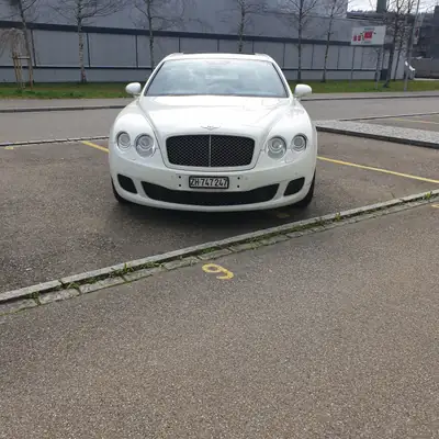 Bentley Continental Flying Spur Speed 2009 — Berline de prestige 610 ch, son NAIM premium — Seitenansicht