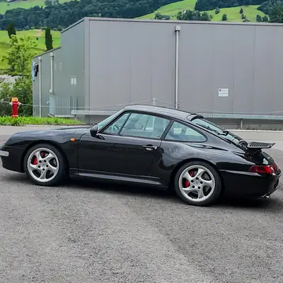 Porsche 911 Carrera 4S 1996 — Légendaire coupé sport, révision moteur 2023 — fianco