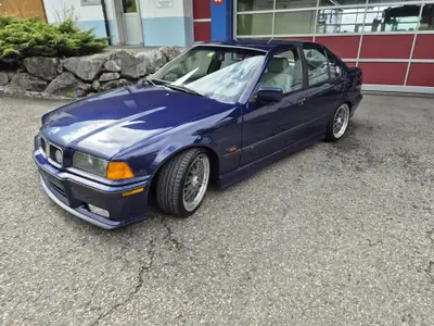 BMW 328i 1995 — Berline sportive de référence, 193 ch et transmission manuelle — Innenraum