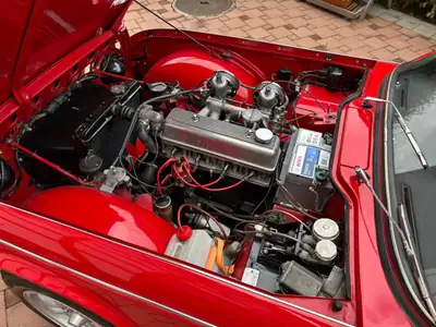 Triumph TR4A — Cabriolet anglais de légende, palmarès rallye exceptionnel — fianco