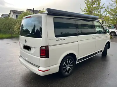 VW T6 California Beach — Le camping-car aménagé pour l'aventure en famille — Seitenansicht