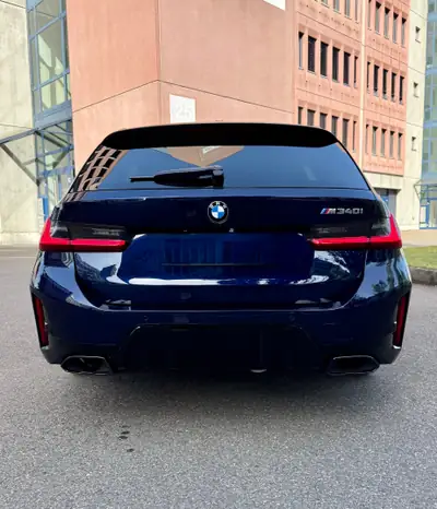 BMW M340i xDrive Touring — Break sportif hybride 48V, 3300 km seulement — Heckansicht