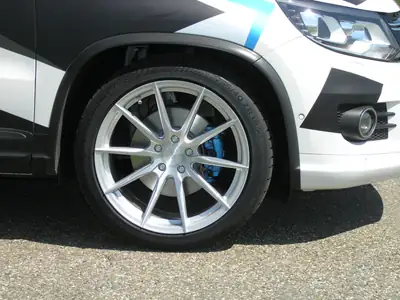 VW Tiguan 2.0 TDI BlueMotion 4Motion — SUV familial robuste, 121'000 km, transmission DSG — côté