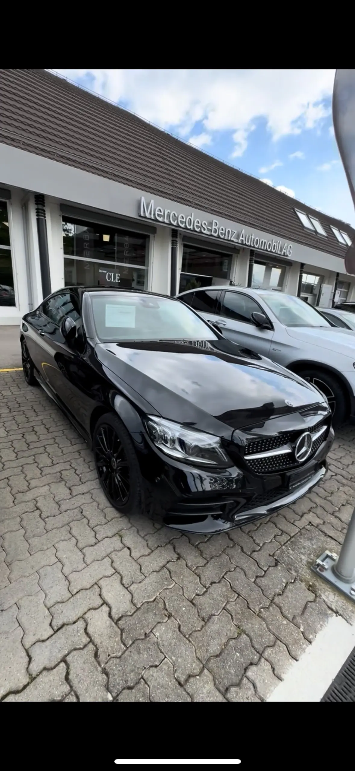 Mercedes-Benz C 200 Coupé AMG Line 4Matic — Élégance sportive et technologie hybride — vue extérieure