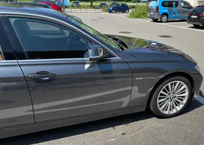BMW 328i xDrive Touring — Familiale sportive, 212 000 km, traction intégrale — side view