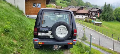 Land Rover Discovery 300 TDI — 7 places, robustesse légendaire, diesel fiable — Heckansicht