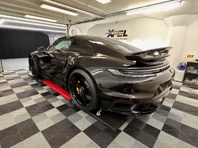 Porsche 911 Turbo S PDK 2023 — 650 ch, protection intégrale XPEL, garantie usine — côté