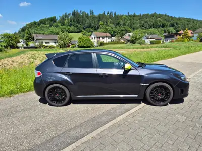Subaru Impreza WRX STI 2010 — Sportive 4WD 301 ch, transmission manuelle — côté