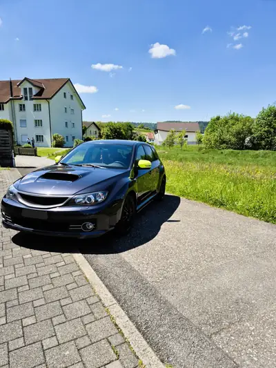 Subaru Impreza WRX STI 2010 — Sportive 4WD 301 ch, transmission manuelle — arrière