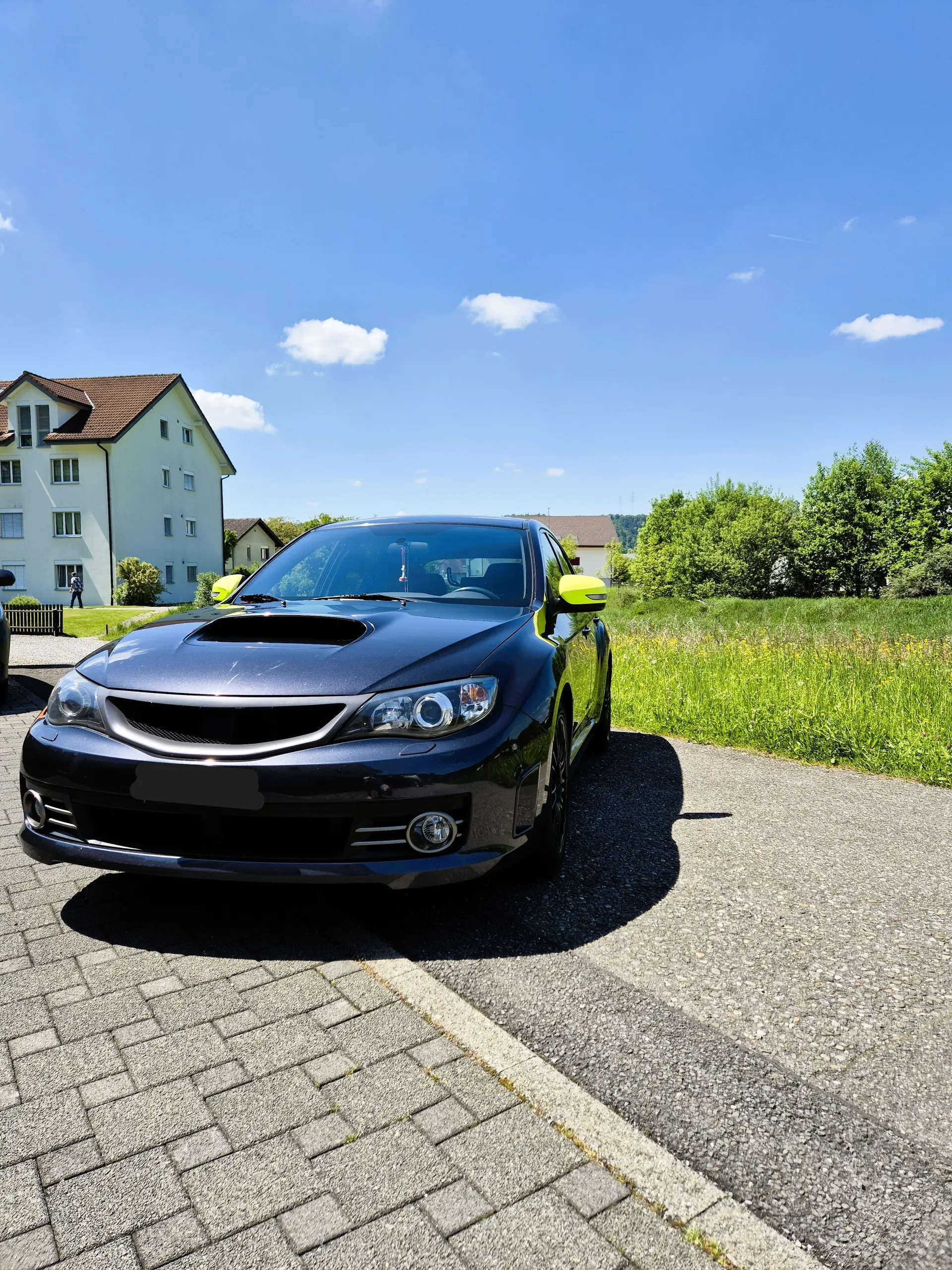 Subaru Impreza WRX STI 2010 — Sportive 4WD 301 ch, transmission manuelle — vue extérieure