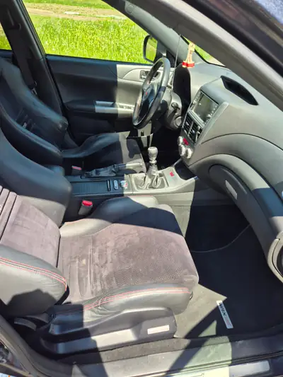 Subaru Impreza WRX STI 2010 — Sportive 4WD 301 ch, transmission manuelle — détail