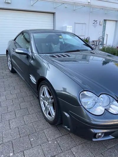 Mercedes-Benz SL 55 AMG — Cabriolet haute performance, 517 ch et 98'000 km seulement — fianco
