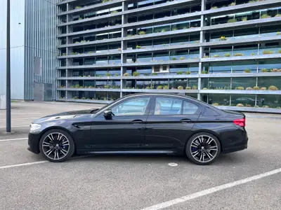 BMW M5 xDrive Competition — 626 ch de pure performance, 67 000 km seulement — side view