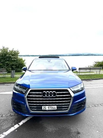 Audi Q7 3.0 TDI Quattro — SUV 7 places robuste, freins neufs et 2 jeux de roues premium — side view