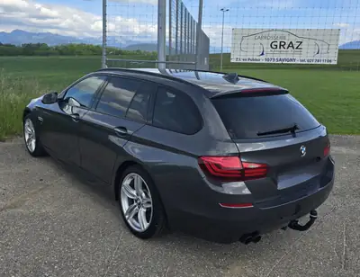 BMW 528i Touring xDrive — Break élégant, motorisation efficace et équipements premium — fianco
