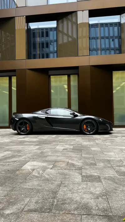 McLaren 650S Spider — Roadster V8 650 ch, carbone intégral, véhicule CH — côté