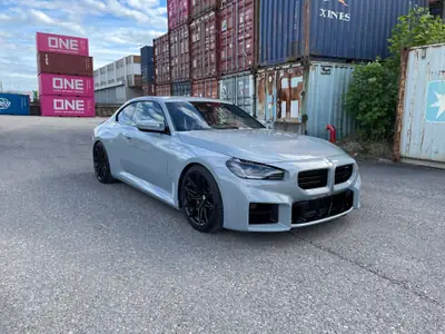 BMW M2 Coupé — 460 ch dynamiques, 15'000 km seulement, sans sinistre — fianco