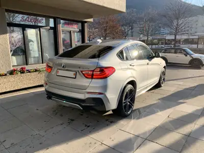 BMW X4 xDrive 20d M Sport Steptronic — SUV coupé diesel performant, 145'000 km — fianco