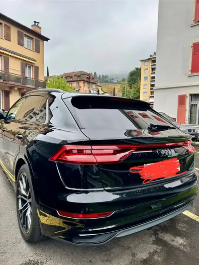 Audi Q8 55 TFSI e quattro — SUV coupé hybride rechargeable, 381 ch et 80 000 km — arrière