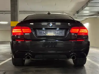 BMW 335i xDrive Coupé — Sportivité allemande et traction intégrale — side view
