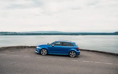 Audi RS3 Sportback — 400 ch TSI quattro, moteur révisé, état concession — side view