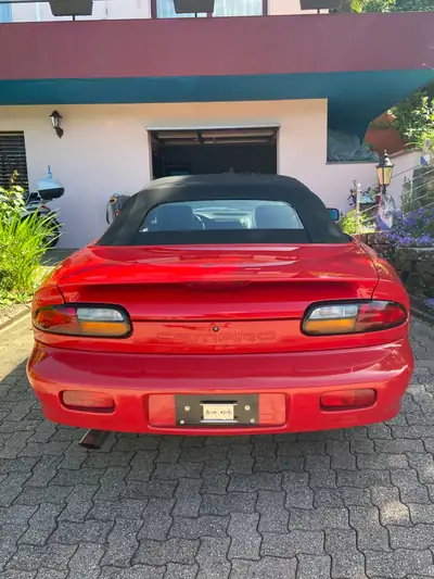 Chevrolet Camaro Convertible 1998 — Cabriolet américain mythique, moteur V6 193 ch — fianco