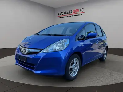 Honda Jazz 1.3i Hybrid Comfort CVT — Citadine économe et fiable, sans accident — side view