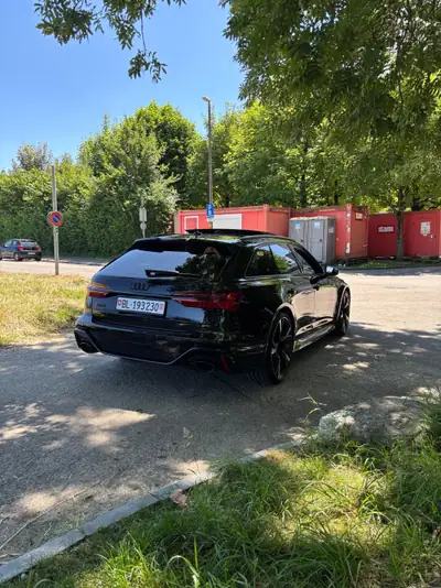 Audi RS6 Avant 2024 — Break haute performance, quasi neuf avec garantie constructeur — Heckansicht