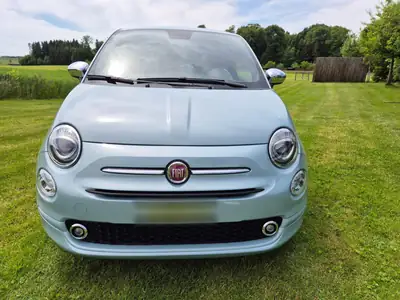 Fiat 500 1.0 Hybrid Swiss Edition 2024 — Citadine écologique et stylée — Seitenansicht