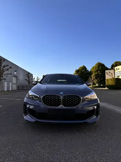BMW M135i xDrive Steptronic — Sportive compacte 306 ch, transmission automatique, 55 000 km — arrière