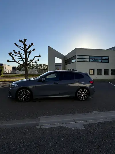 BMW M135i xDrive Steptronic — Sportive compacte 306 ch, transmission automatique, 55 000 km — tableau de bord