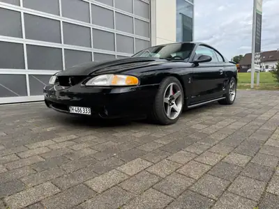 Ford Mustang SVT Cobra 1998 — Muscle car légendaire, 306 ch et boîte manuelle — vista esterna