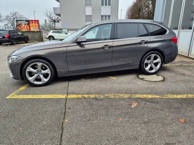 BMW 330i xDrive Touring — Break sportif, 252 ch et transmission intégrale — rear view