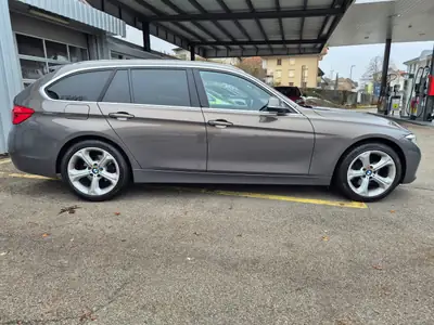 BMW 330i xDrive Touring — Break sportif, 252 ch et transmission intégrale — exterior view