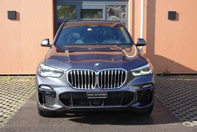 BMW X5 xDrive 40i M-Sport — SUV 7 places premium, toit panoramique et suspension pneumatique — côté