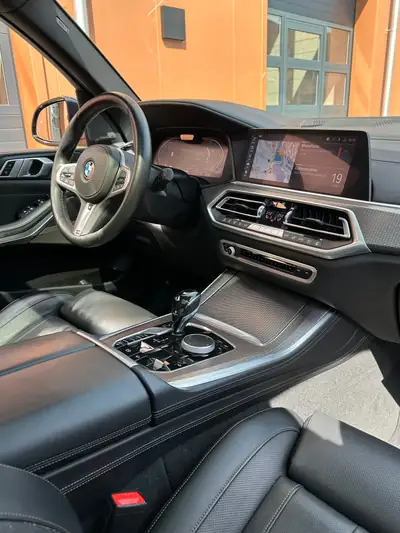 BMW X5 xDrive 40i M-Sport — SUV 7 places premium, toit panoramique et suspension pneumatique — Miniature 16