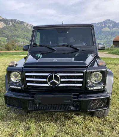 Mercedes-Benz G 500 — L'authentique SUV premium noir Designo, entretien certifié — côté