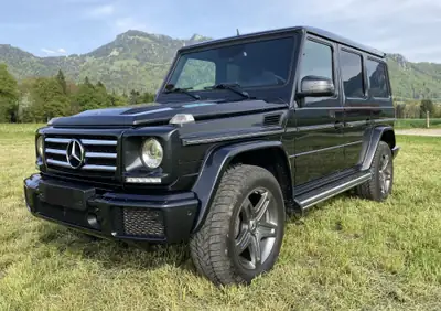 Mercedes-Benz G 500 — L'authentique SUV premium noir Designo, entretien certifié — vue extérieure