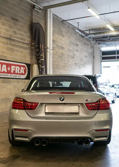 BMW M4 Cabriolet — Roadster de prestige, 431 ch et toile électrique — fianco