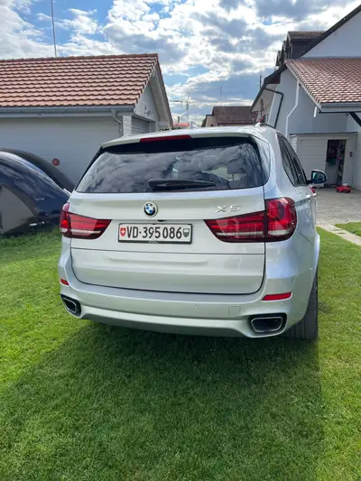 BMW X5 xDrive 40d Pure M Sport Plus — SUV premium 7 places, diesel performant — côté