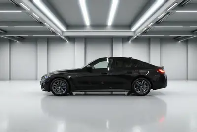 BMW M440i xDrive Gran Coupé — Sportivité et élégance hybride 48V — fianco
