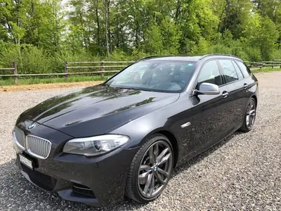 BMW M550d xDrive Touring — Break diesel performant, 381 ch, transmission intégrale — côté